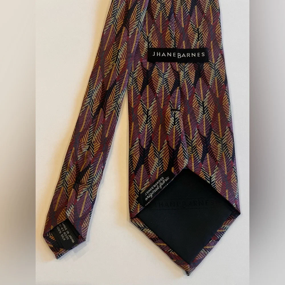Vintage tie with price tag that has a history Jhane Barnes Abstract design